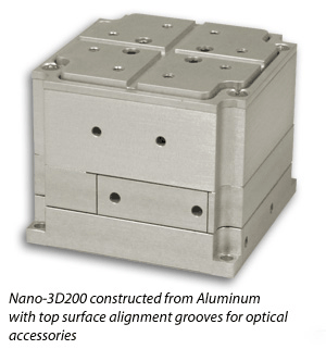 three axis nanopositioner with top surface alignment grooves for optical accessories